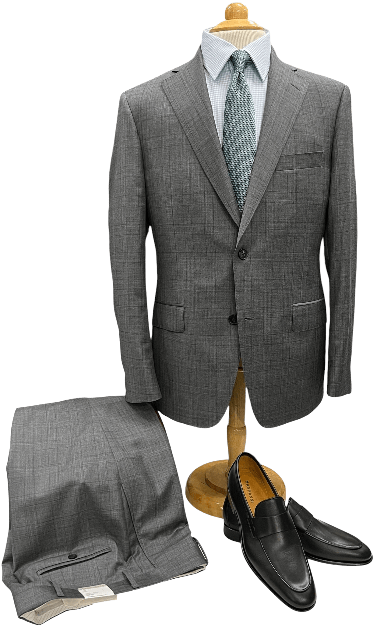Gray plaid suit displayed on a mannequin